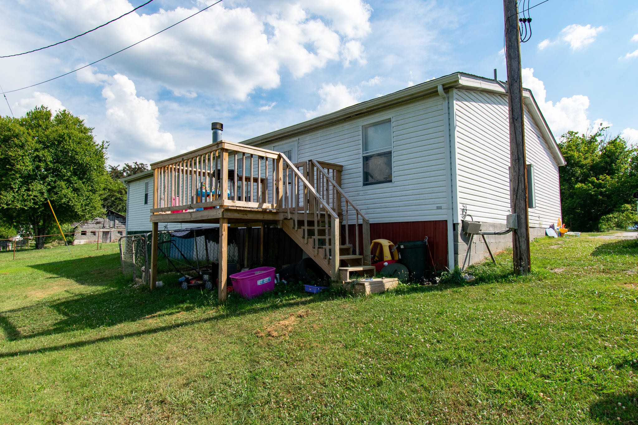 136 Mountain Road Blaine, TN 37709 - Photo 14 of 21 a view of a house with a yard