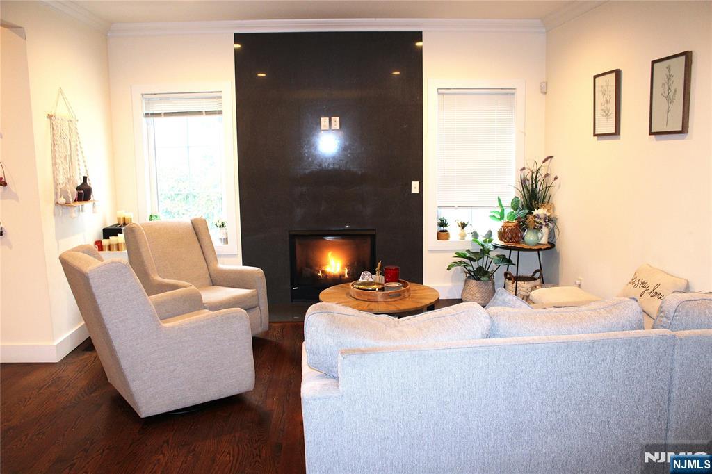 294-296 Tenafly Road Tenafly, NJ 07670 - Photo 8 of 24 a living room with fireplace furniture and a wooden floor