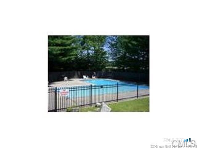 5 Nabby Road, Unit A51 Danbury, CT 06811 - Photo 13 of 13 a picture of street with a bench