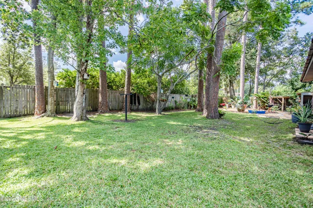 a view of a kitchen from the hallway