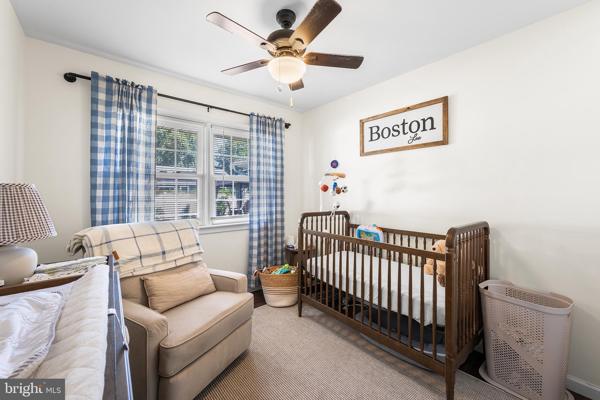 128 Michigan Road Pennsville, NJ 08070 - Photo 14 of 30 a bedroom with furniture and a large window