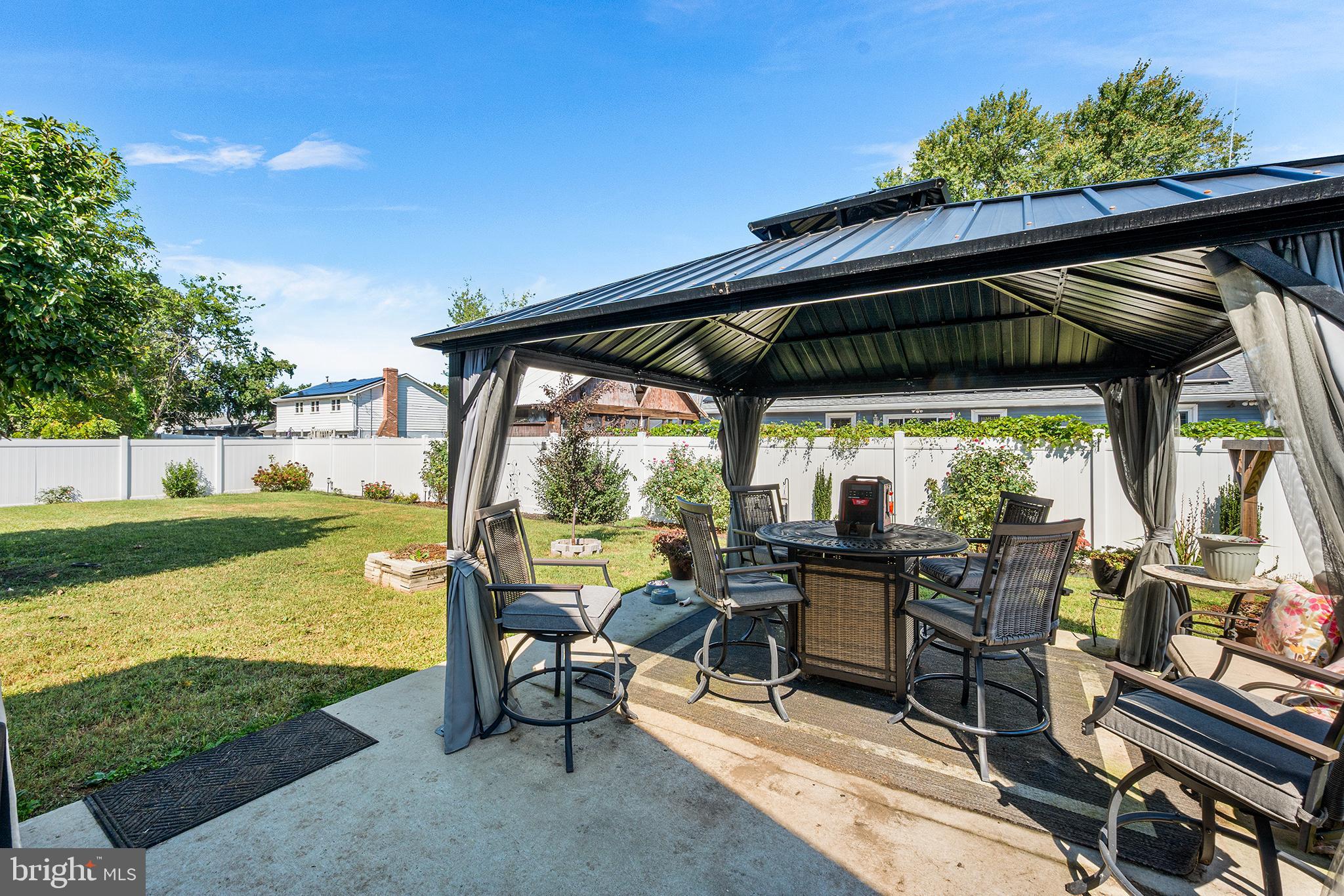 128 Michigan Road Pennsville, NJ 08070 - Photo 24 of 30 a view of swimming pool with lawn chairs and couches