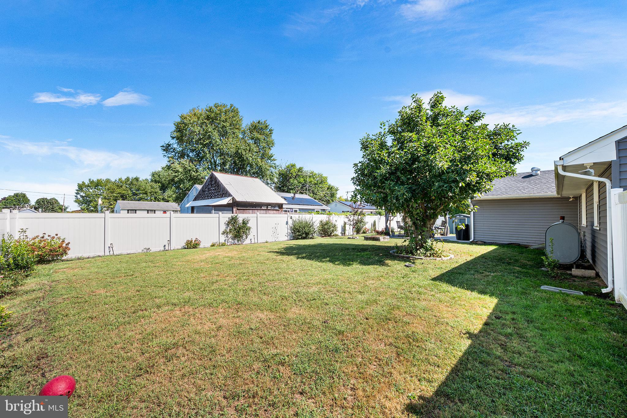 128 Michigan Road Pennsville, NJ 08070 - Photo 26 of 30 a view of backyard of house with green space