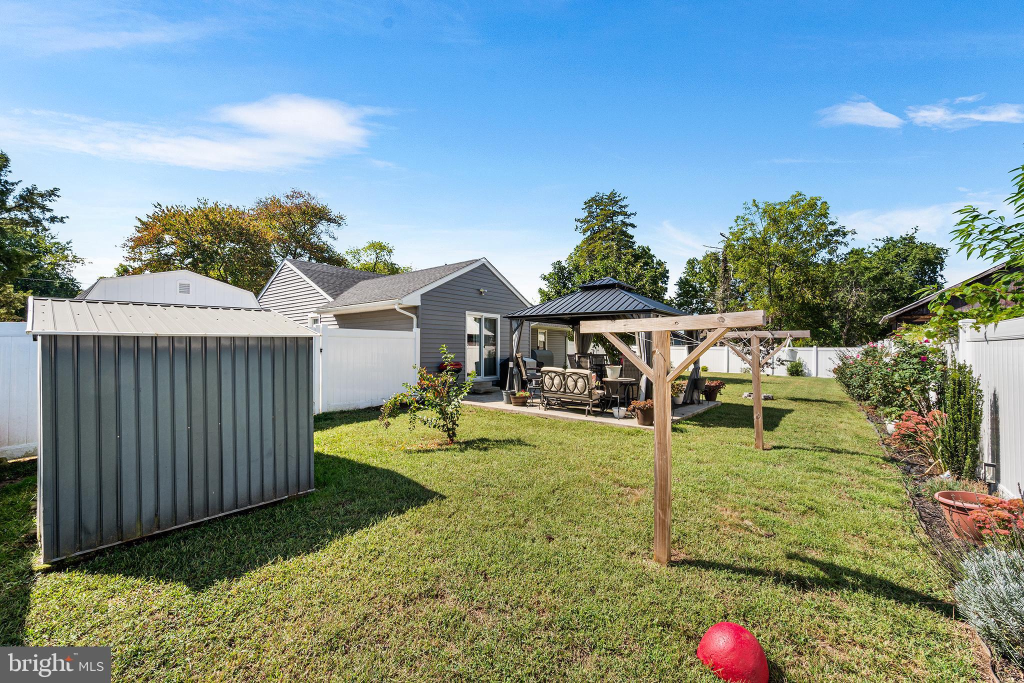 128 Michigan Road Pennsville, NJ 08070 - Photo 28 of 30 a view of a house with backyard