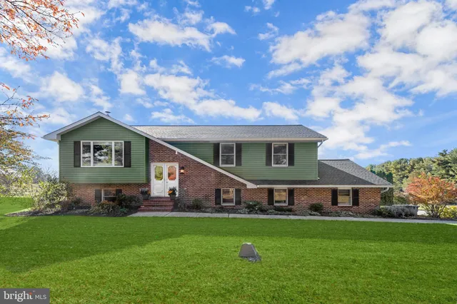 a house view with a garden space