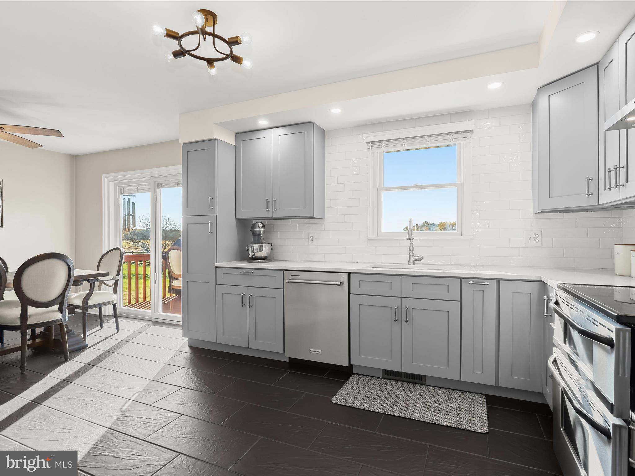 4174 Norrisville Road White Hall, MD 21161 - Photo 15 of 77 a kitchen with sink cabinets and appliances