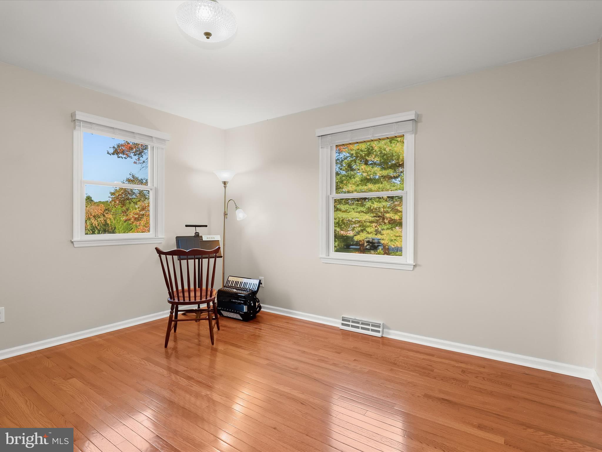 4174 Norrisville Road White Hall, MD 21161 - Photo 25 of 77 a view of a livingroom with wooden floor and a window