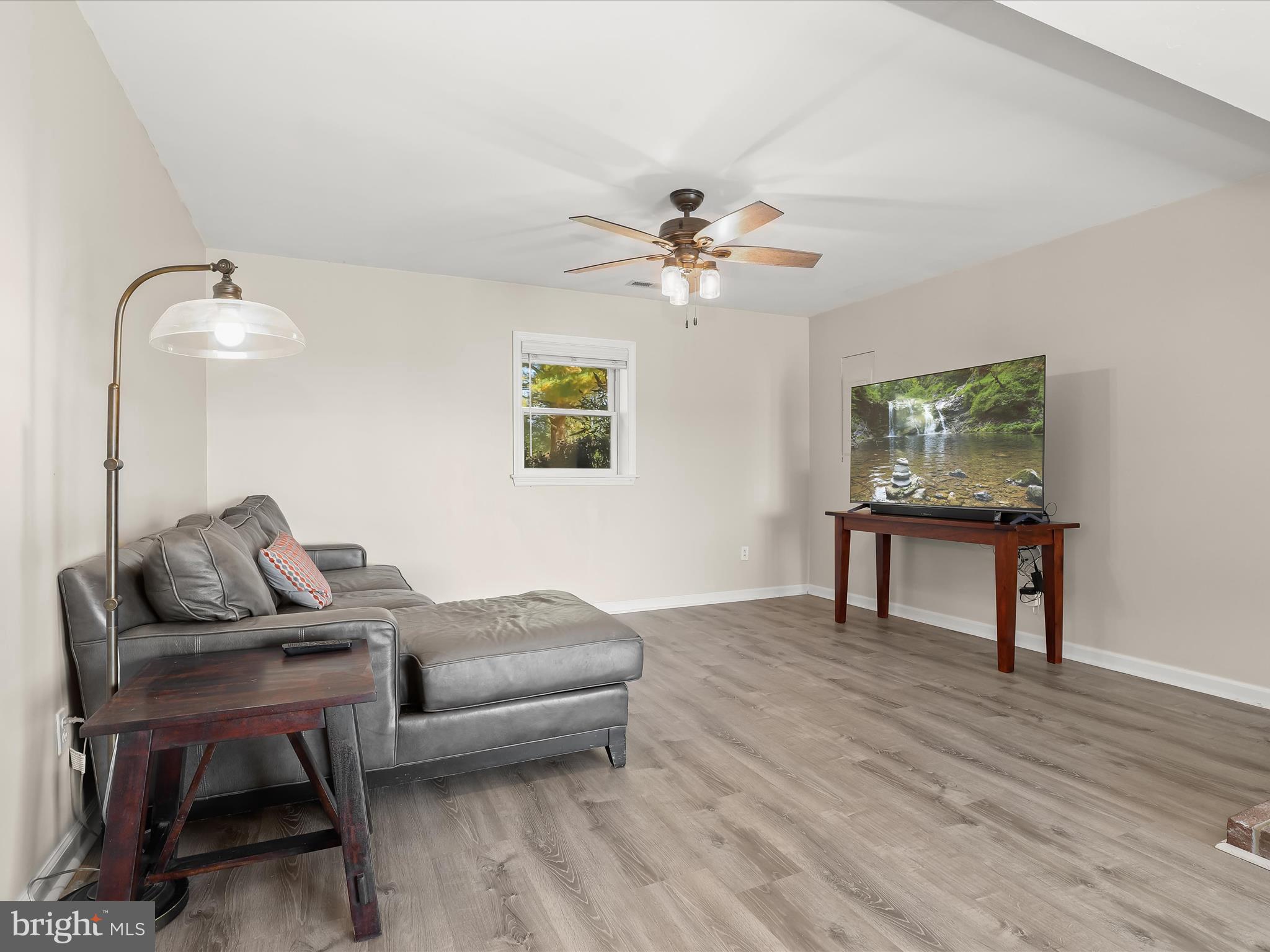 4174 Norrisville Road White Hall, MD 21161 - Photo 30 of 77 a living room with furniture and a wooden floor