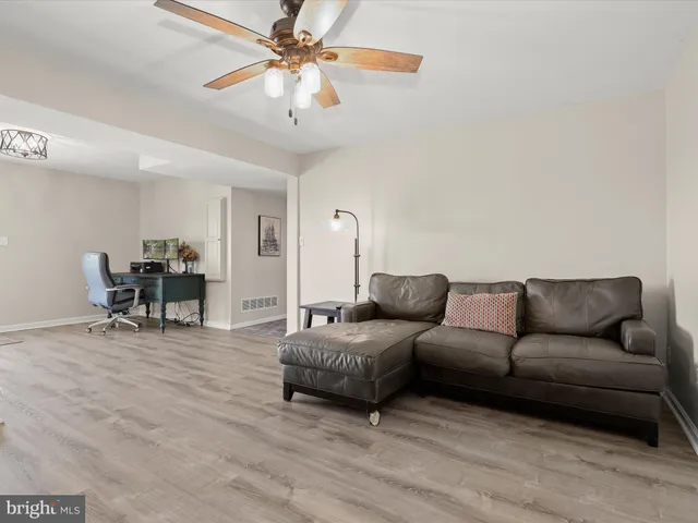 a bathroom with a sink toilet and a mirror