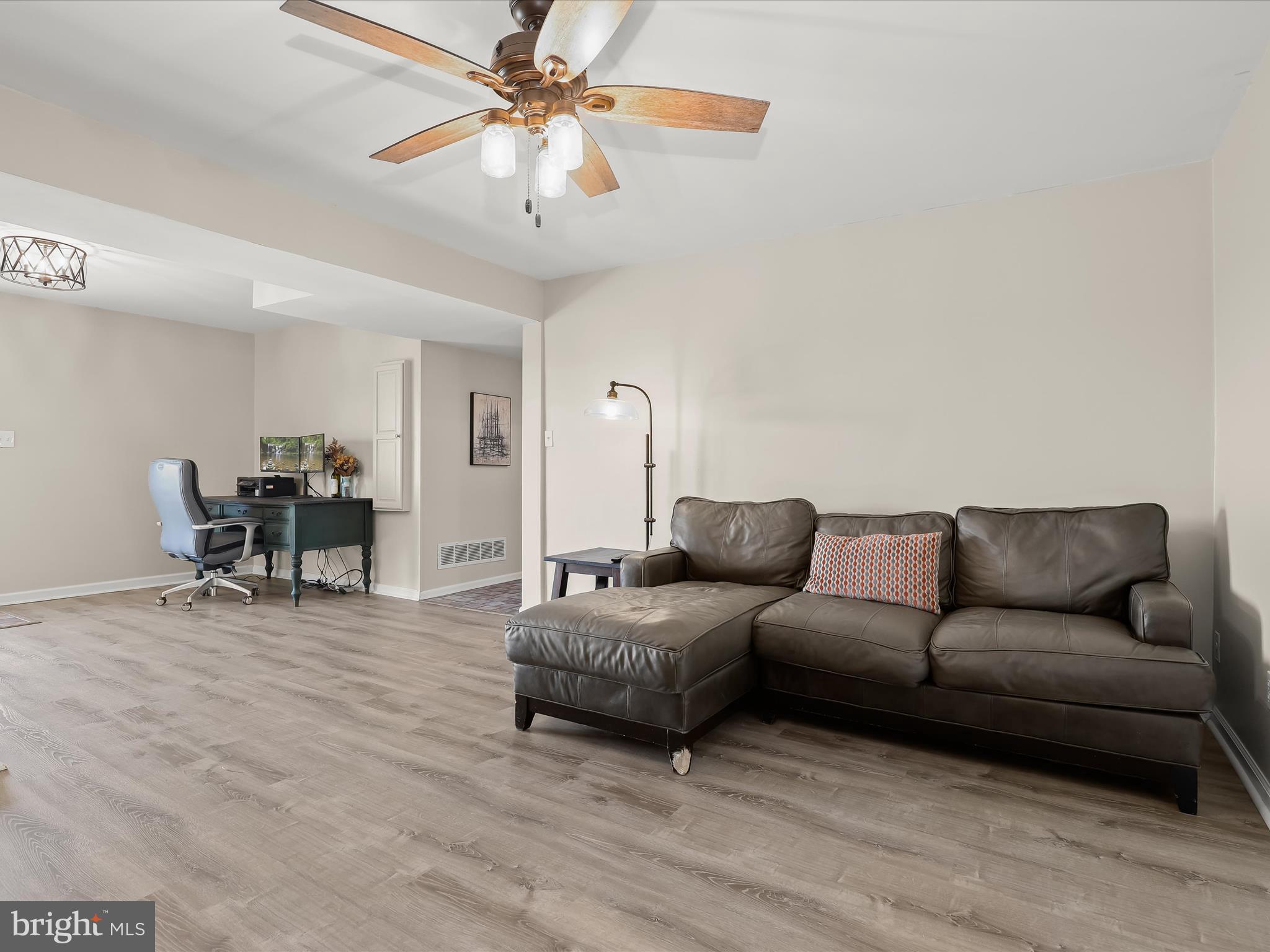 4174 Norrisville Road White Hall, MD 21161 - Photo 31 of 77 a living room with furniture and a chandelier