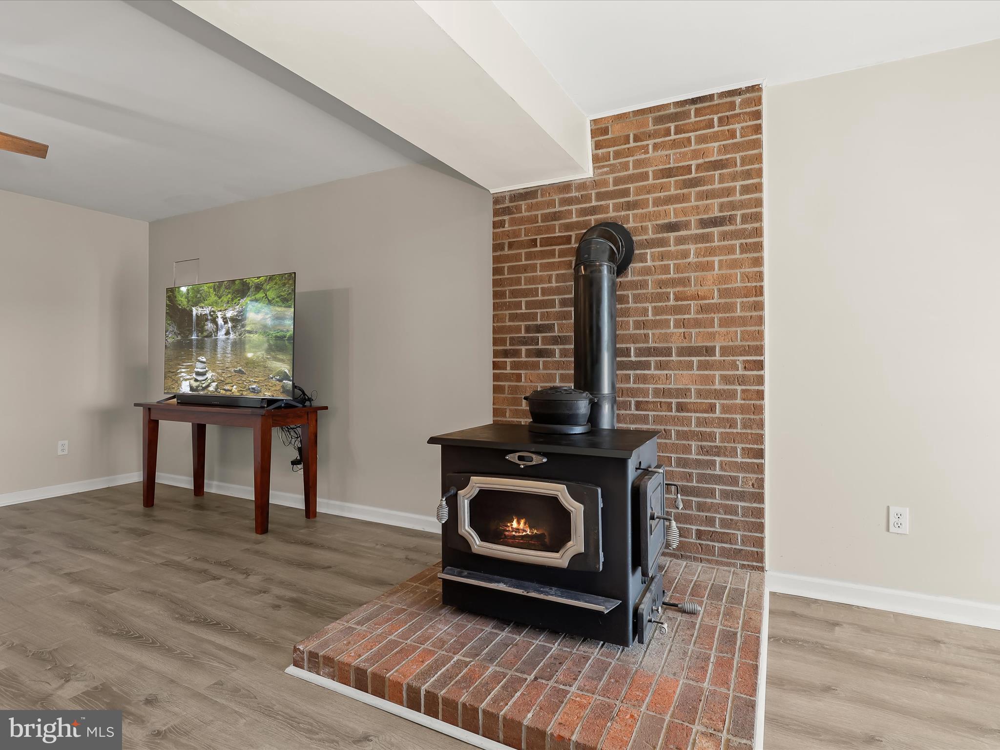 4174 Norrisville Road White Hall, MD 21161 - Photo 34 of 77 a living room with furniture and a fireplace