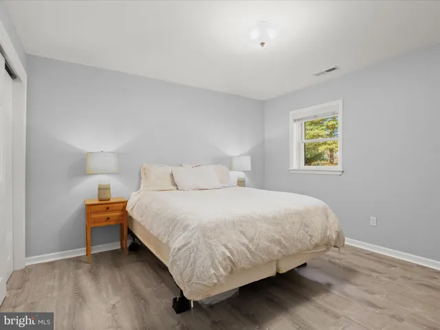 a view of a big yard with table and chairs