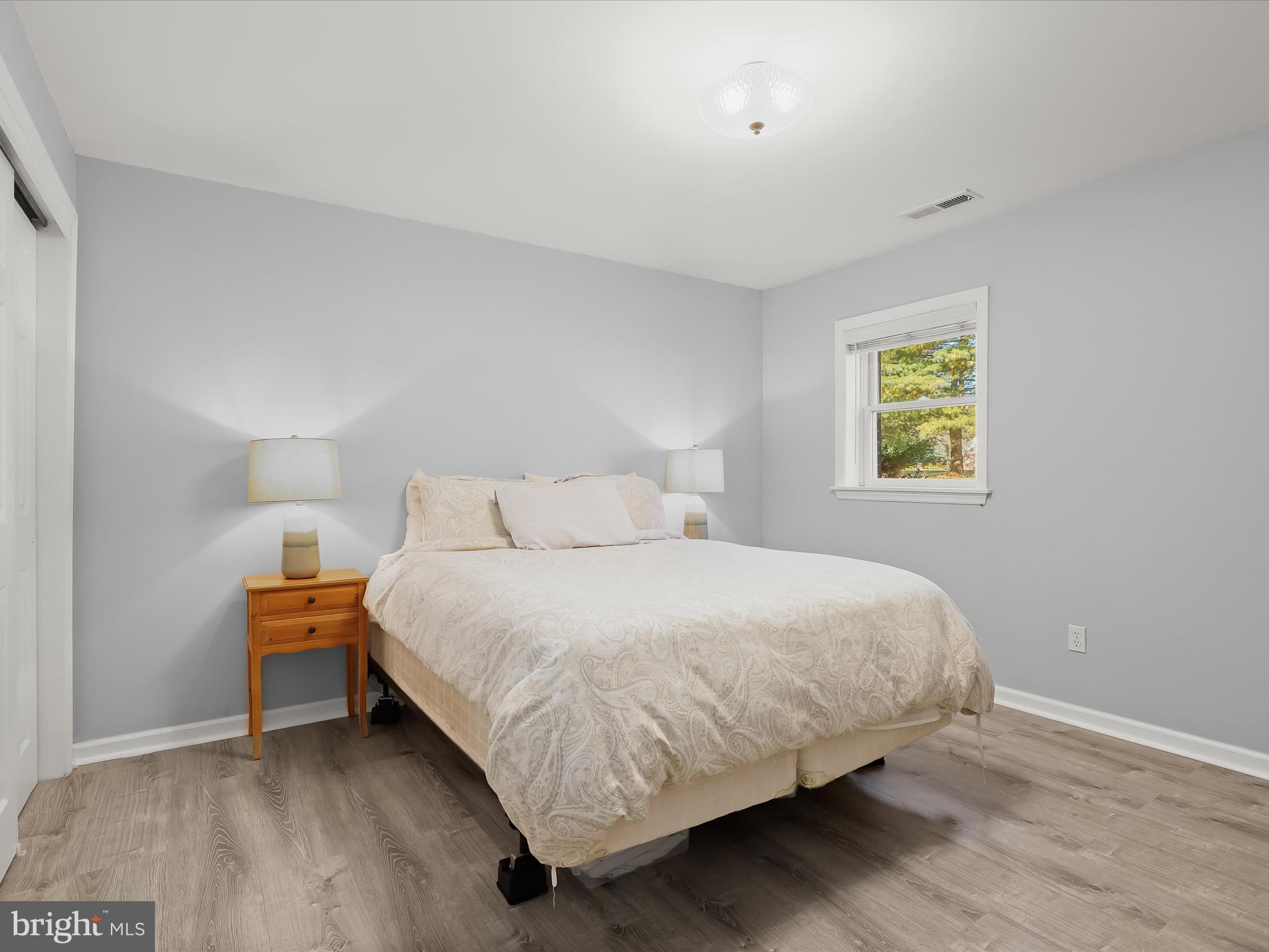 4174 Norrisville Road White Hall, MD 21161 - Photo 35 of 77 a bedroom with a bed and painting on the wall