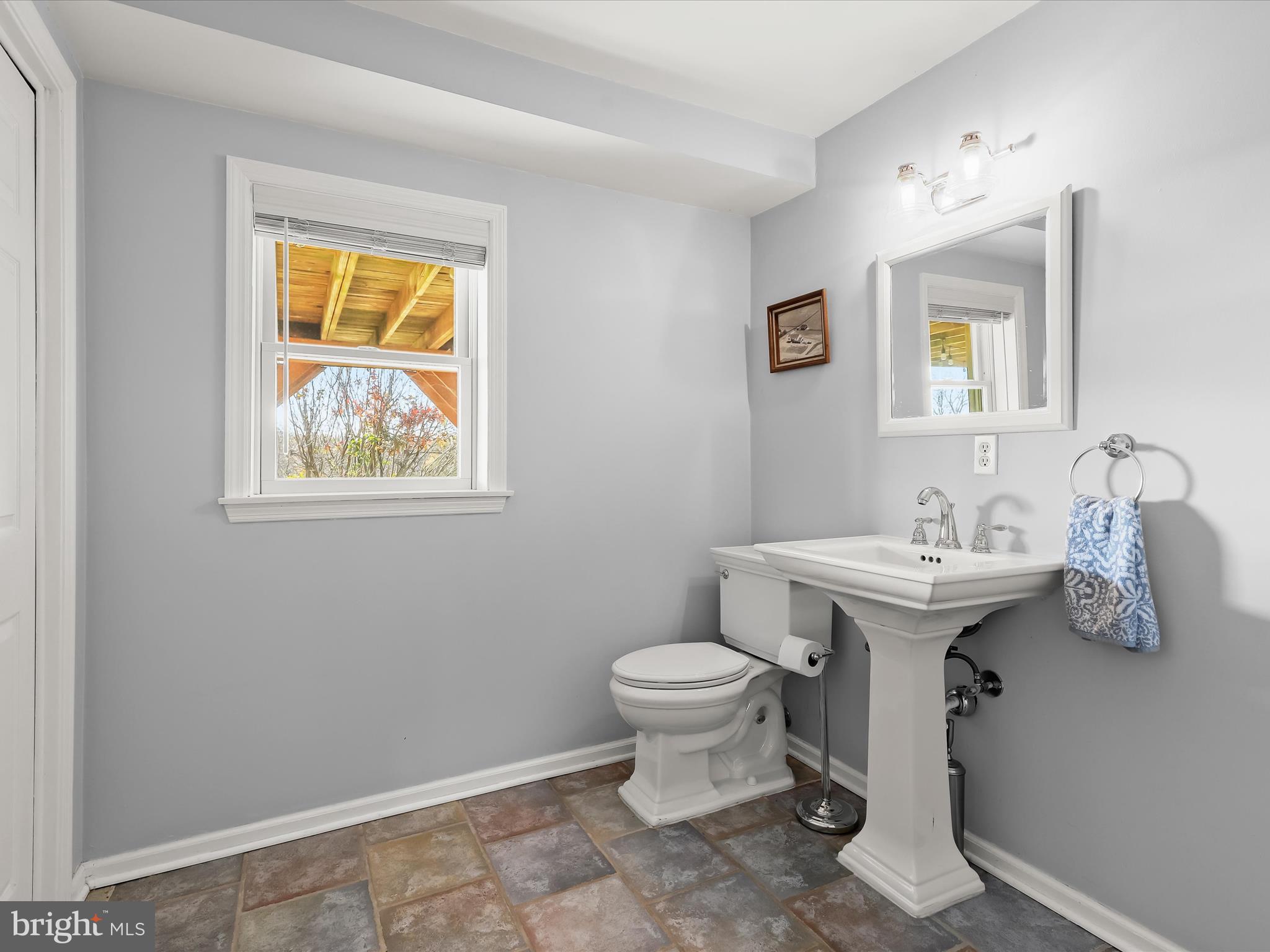 4174 Norrisville Road White Hall, MD 21161 - Photo 37 of 77 a bathroom with a sink toilet and a mirror