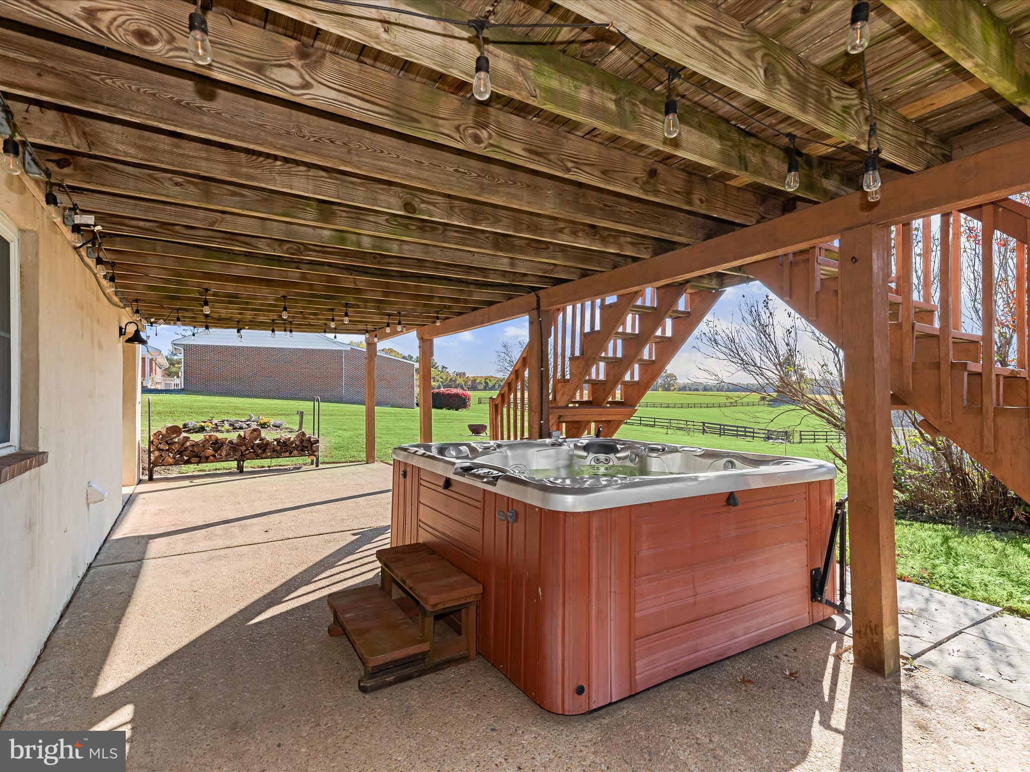 4174 Norrisville Road White Hall, MD 21161 - Photo 42 of 77 a view of a backyard with a tub and trees in the back