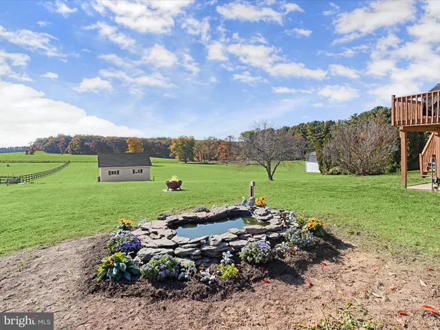 a bathroom with a sink and garden view