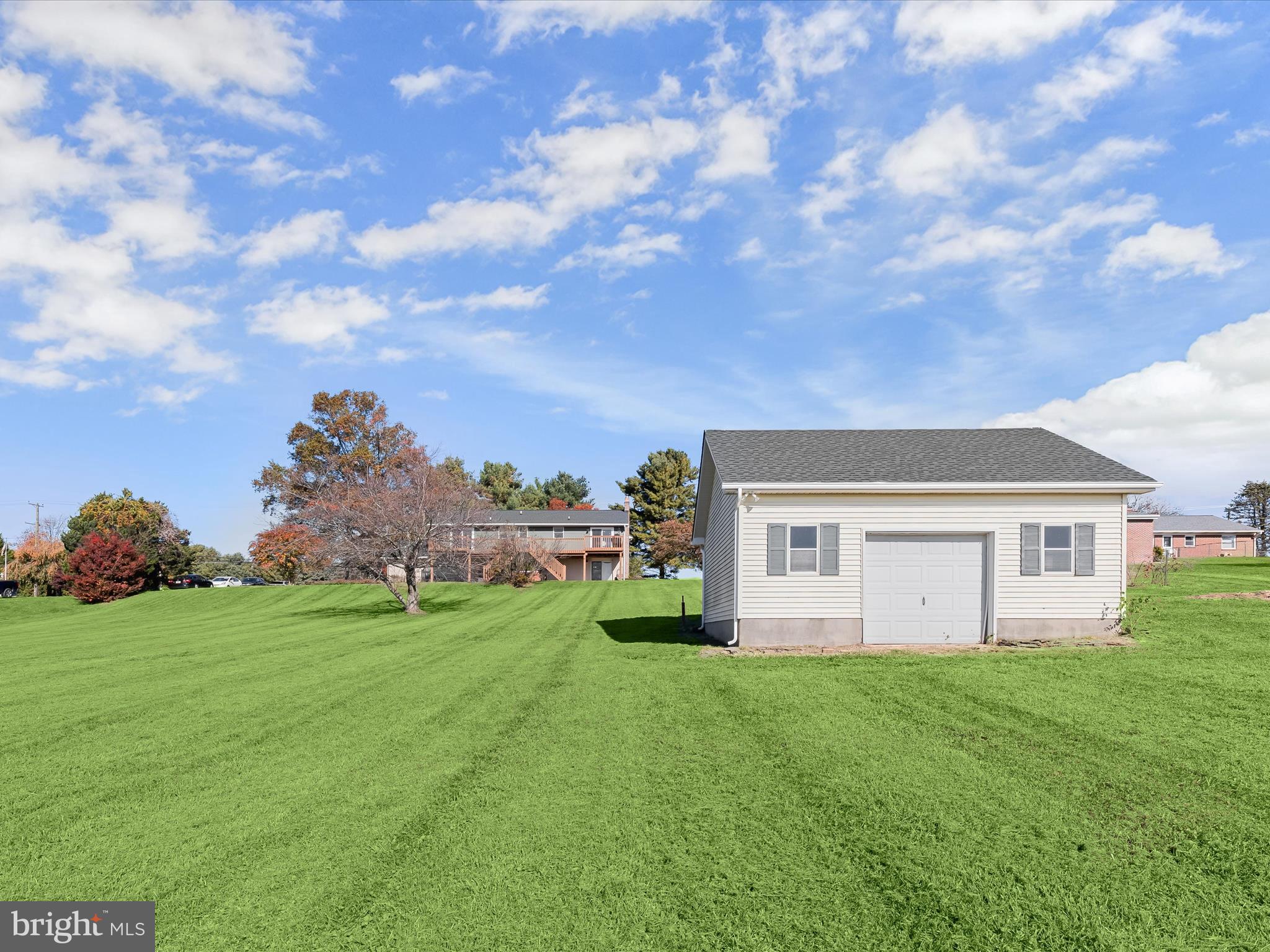 4174 Norrisville Road White Hall, MD 21161 - Photo 53 of 77 a view of a house with a big yard and a large tree