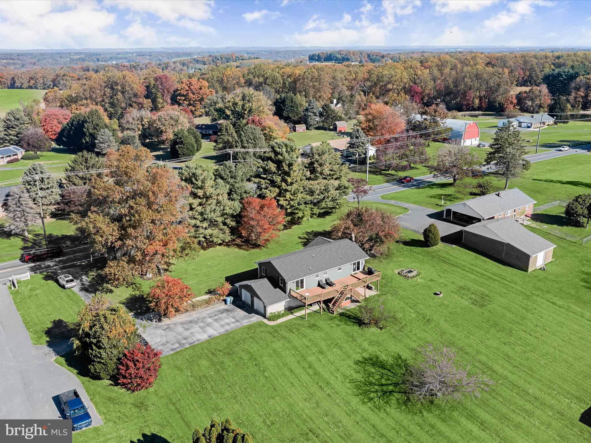 4174 Norrisville Road White Hall, MD 21161 - Photo 66 of 77 an aerial view of a house with a garden and mountain view in back