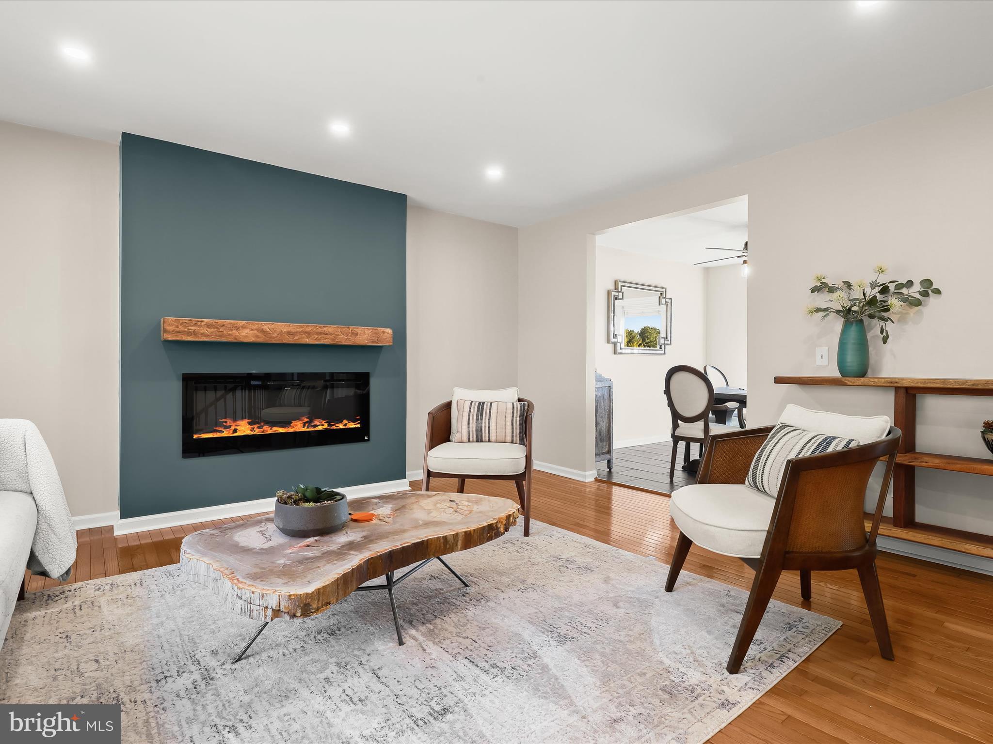 4174 Norrisville Road White Hall, MD 21161 - Photo 7 of 77 a living room with furniture and a fireplace
