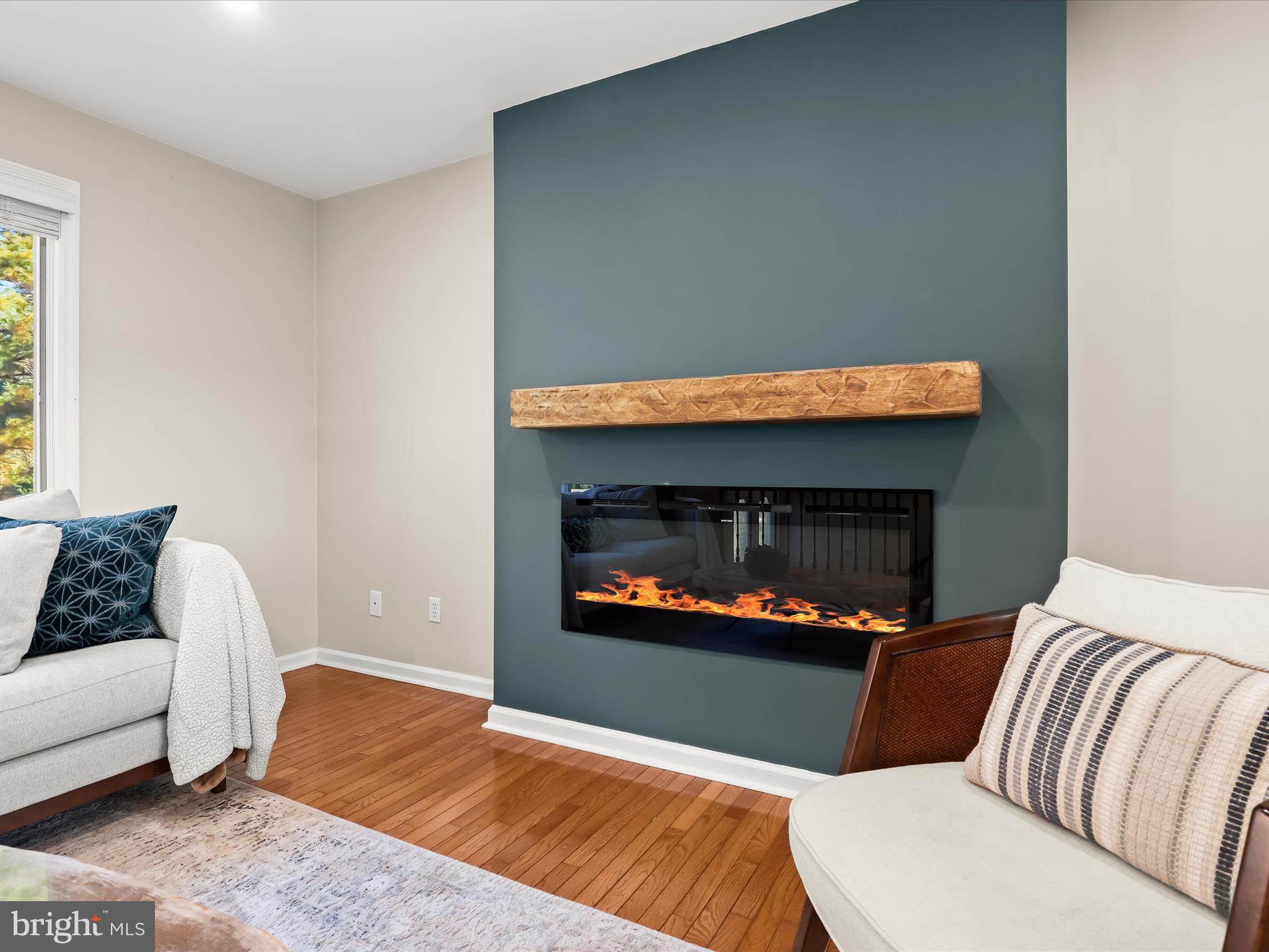 4174 Norrisville Road White Hall, MD 21161 - Photo 8 of 77 a living room with furniture and a fireplace