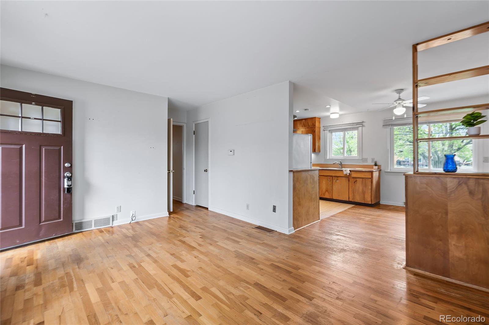 1971 Evergreen Avenue Boulder, CO 80304 - Photo 12 of 36 a view of a kitchen with kitchen island wooden floor and window
