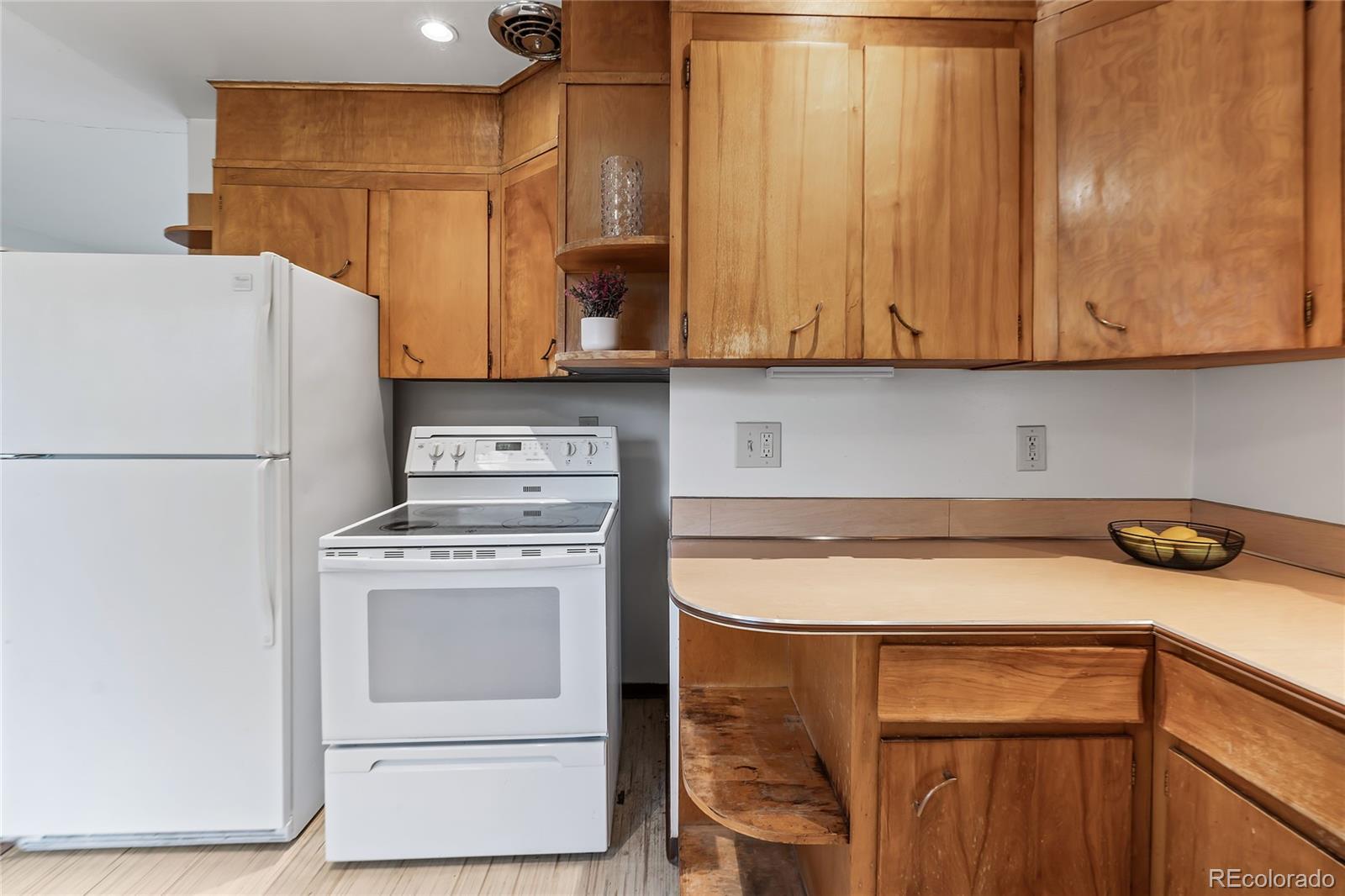 1971 Evergreen Avenue Boulder, CO 80304 - Photo 21 of 36 a kitchen with a refrigerator and cabinets