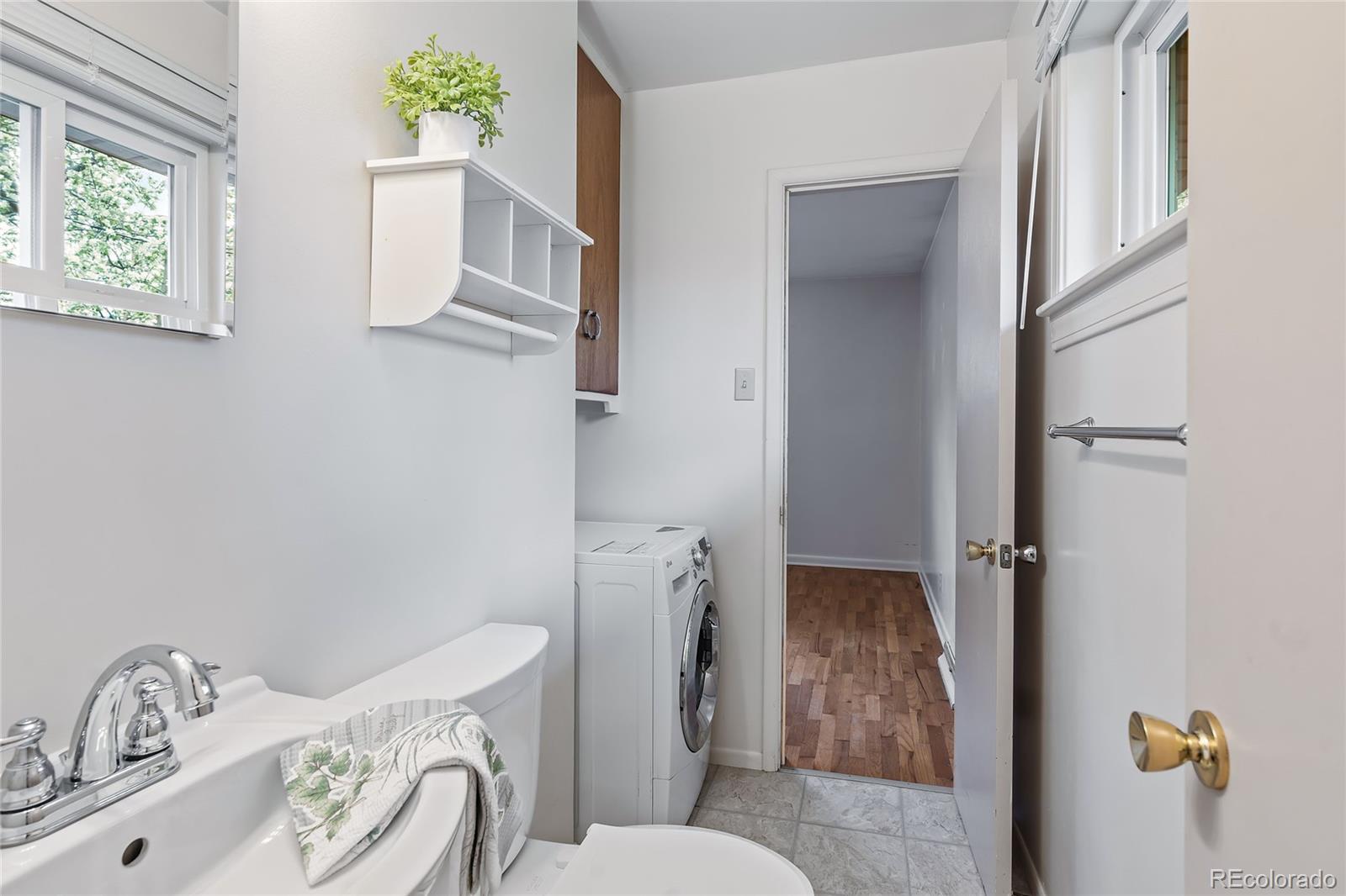 1971 Evergreen Avenue Boulder, CO 80304 - Photo 23 of 36 a bathroom with a sink and toilet