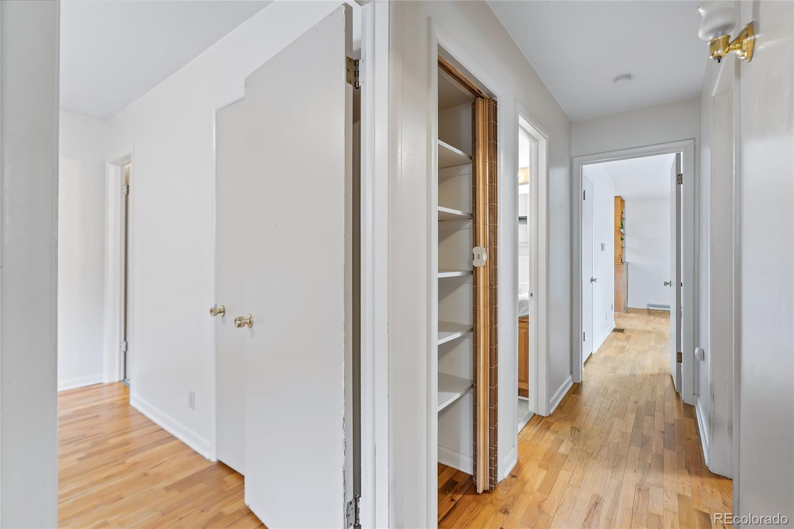 1971 Evergreen Avenue Boulder, CO 80304 - Photo 24 of 36 a view of a hallway with wooden floor