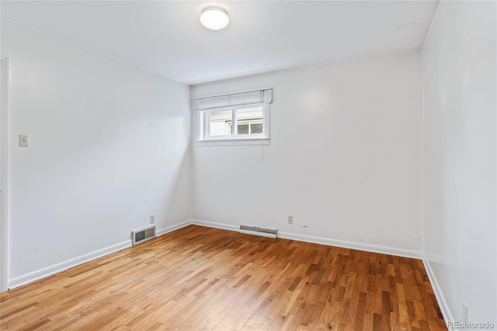 1971 Evergreen Avenue Boulder, CO 80304 - Photo 26 of 36 a view of empty room with wooden floor