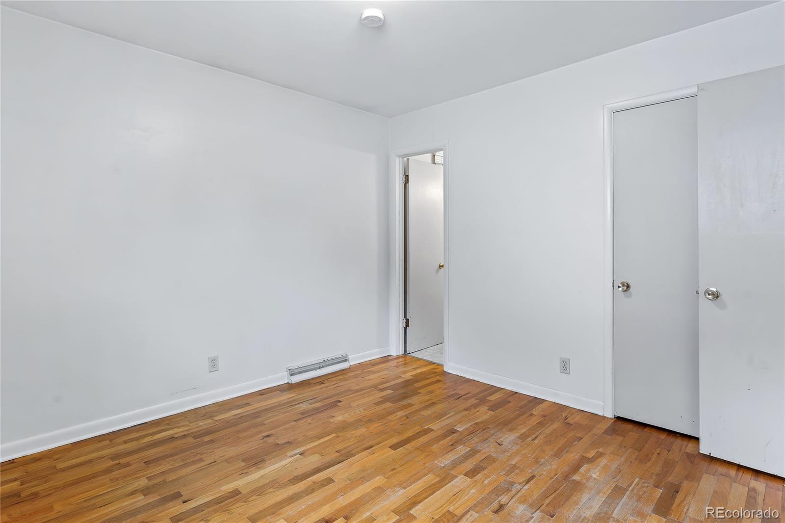 1971 Evergreen Avenue Boulder, CO 80304 - Photo 27 of 36 a view of empty room with wooden floor