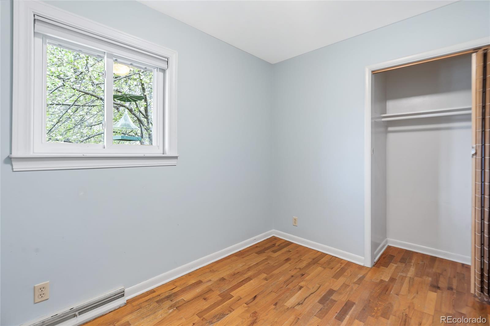 1971 Evergreen Avenue Boulder, CO 80304 - Photo 36 of 36 a view of empty room with wooden floor and fan