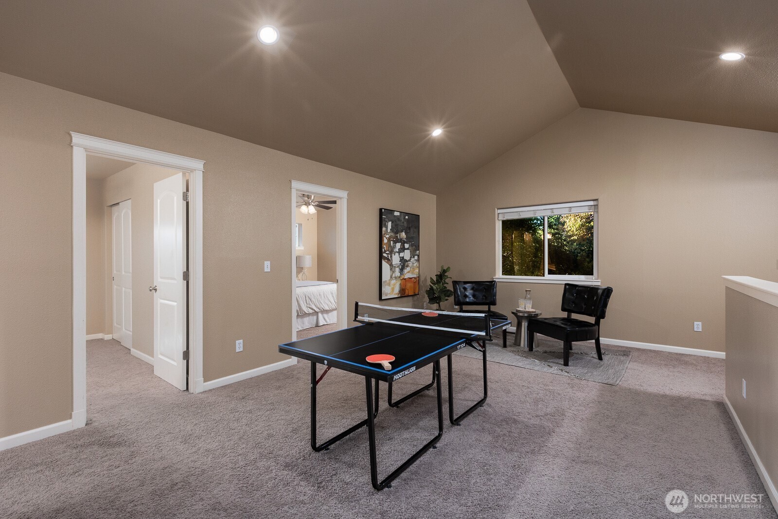 5002 70th Way Southeast Lacey, WA 98513 - Photo 14 of 40 a living room with furniture a rug and a window