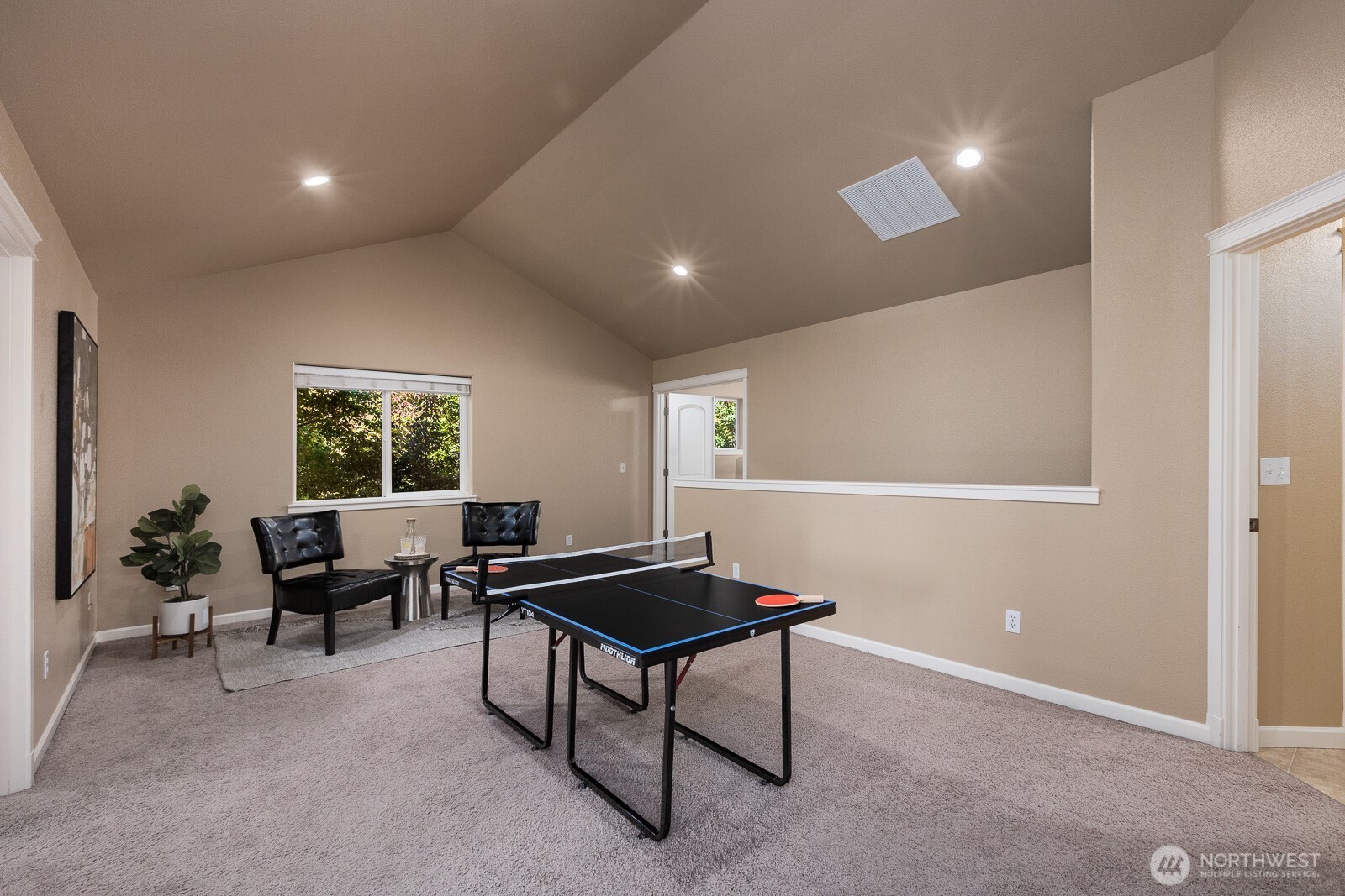 5002 70th Way Southeast Lacey, WA 98513 - Photo 15 of 40 a living room with furniture and a potted plant