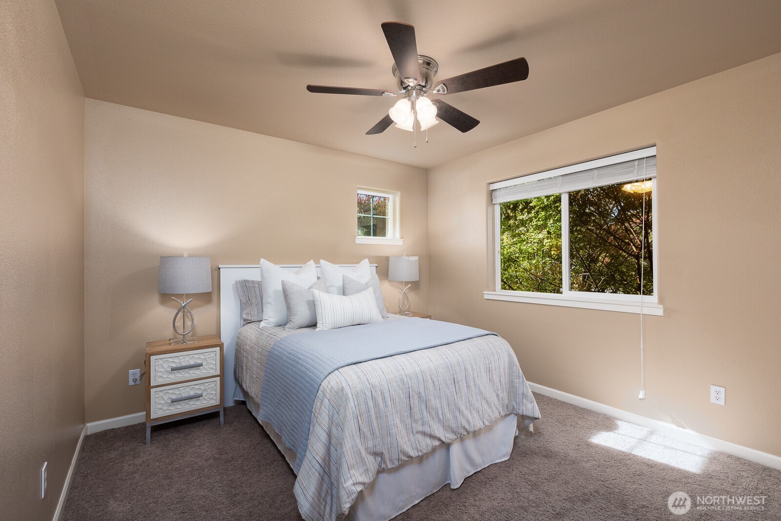 5002 70th Way Southeast Lacey, WA 98513 - Photo 25 of 40 a bedroom with a bed and a window