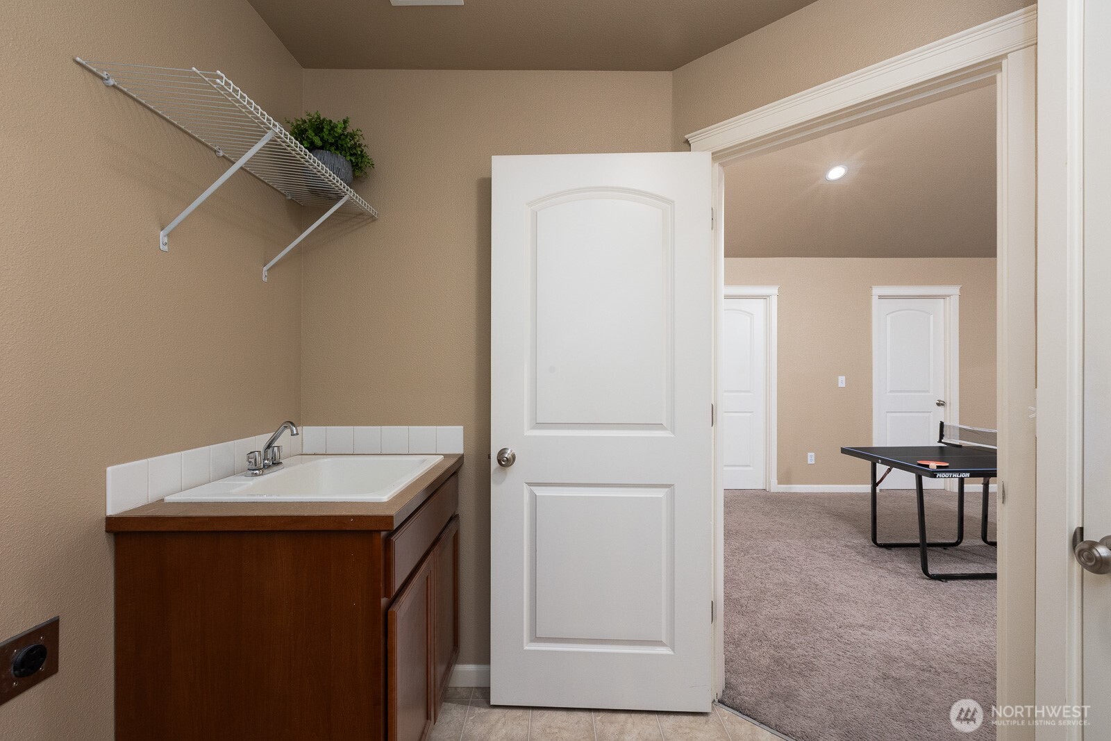 5002 70th Way Southeast Lacey, WA 98513 - Photo 30 of 40 a bathroom with a sink and a mirror