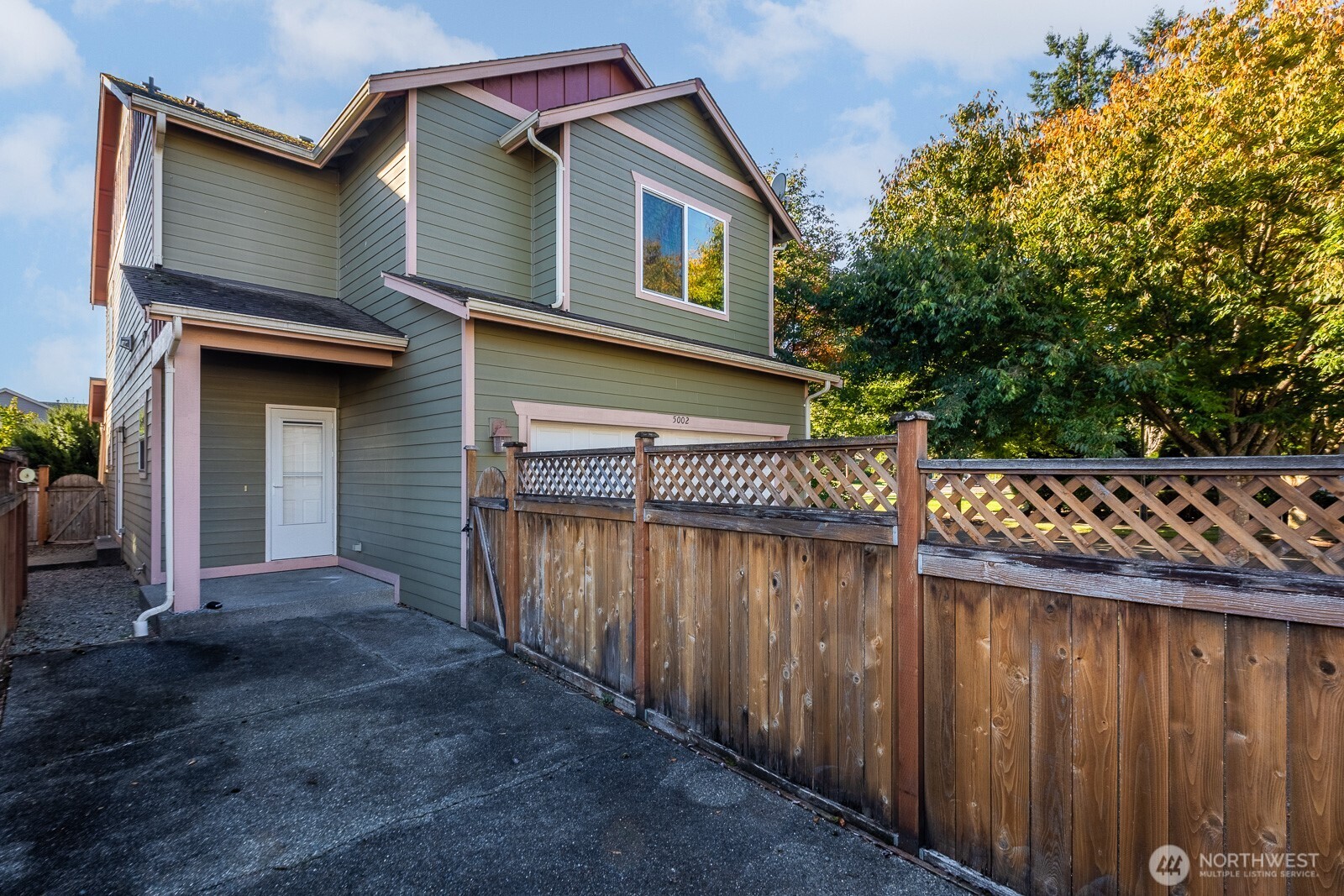 5002 70th Way Southeast Lacey, WA 98513 - Photo 31 of 40 a front view of a house with a yard