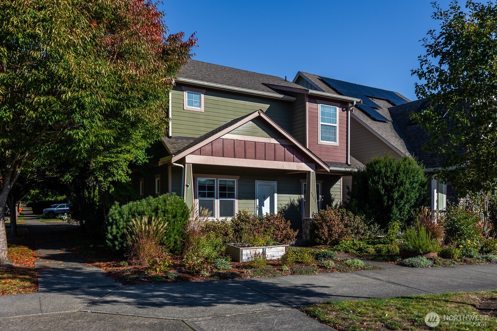 5002 70th Way Southeast Lacey, WA 98513 - Photo 39 of 40 a front view of a house with a yard
