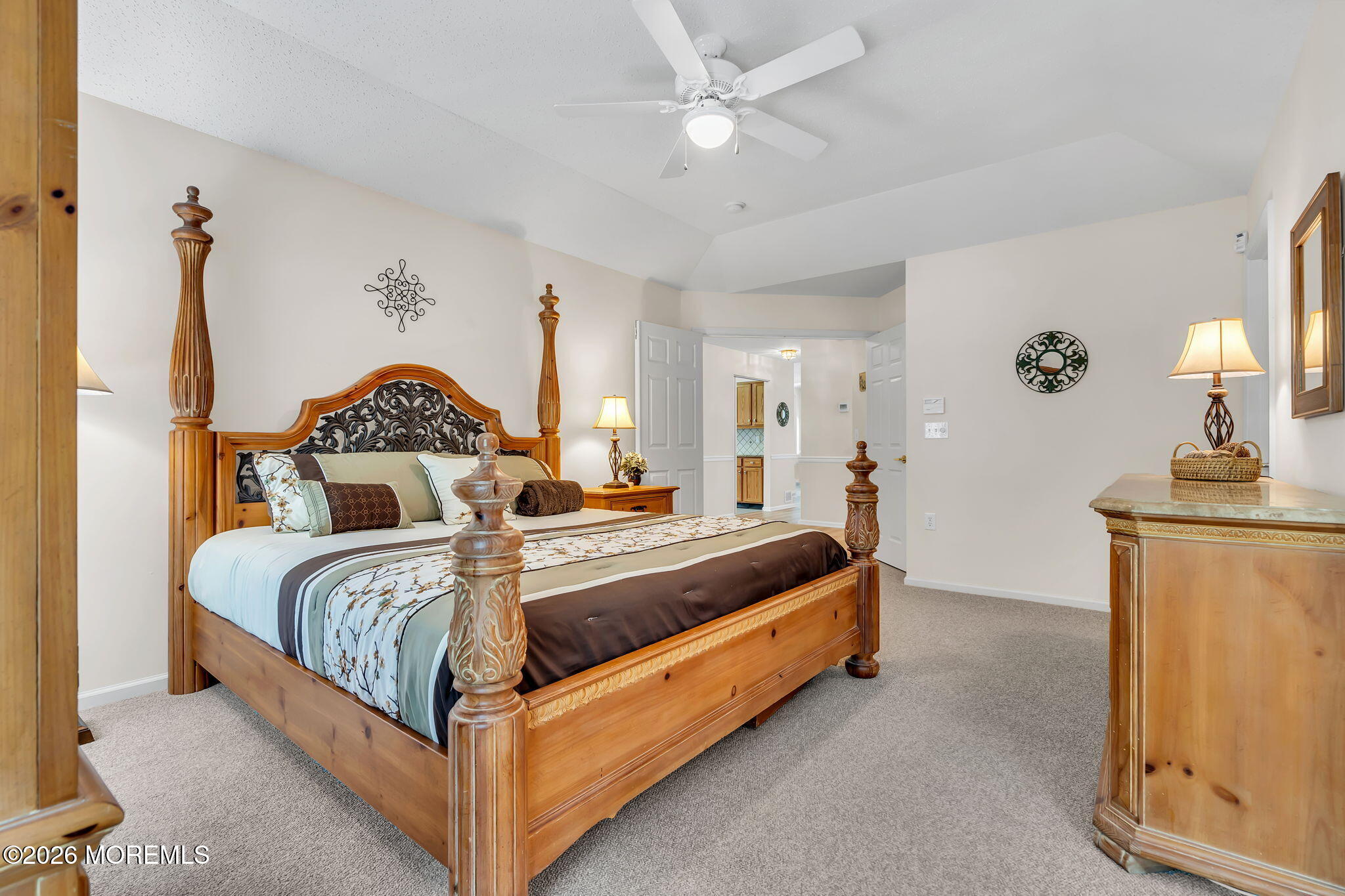 10 Congressional Road Jackson, NJ 08527 - Photo 40 of 72 a bed room with a bed and a chandelier