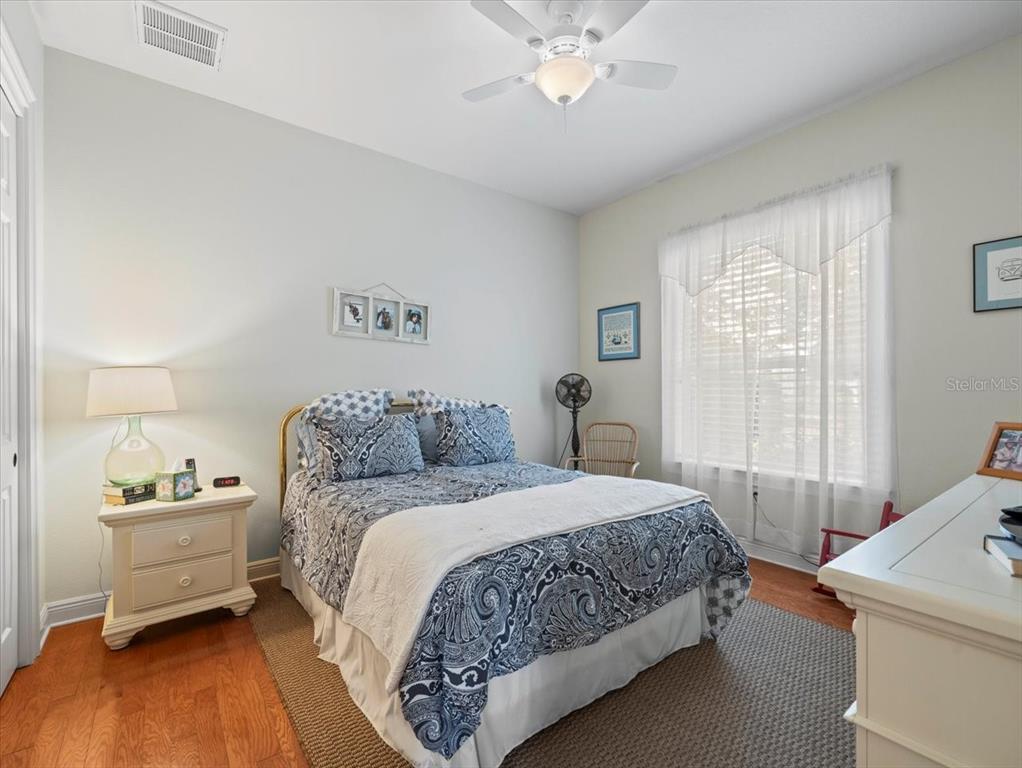 8480 Athens Court Weeki Wachee, FL 34613 - Photo 27 of 60 a bedroom with a bed and a window