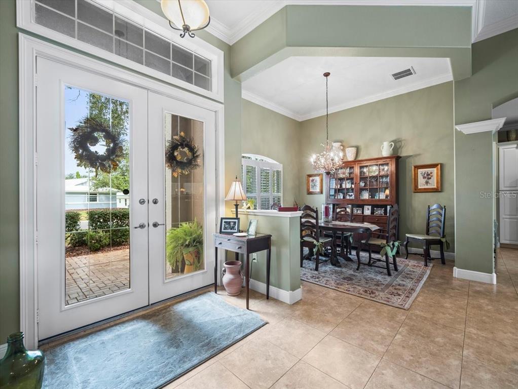 8480 Athens Court Weeki Wachee, FL 34613 - Photo 4 of 60 a view of a dining room with furniture window and outside view
