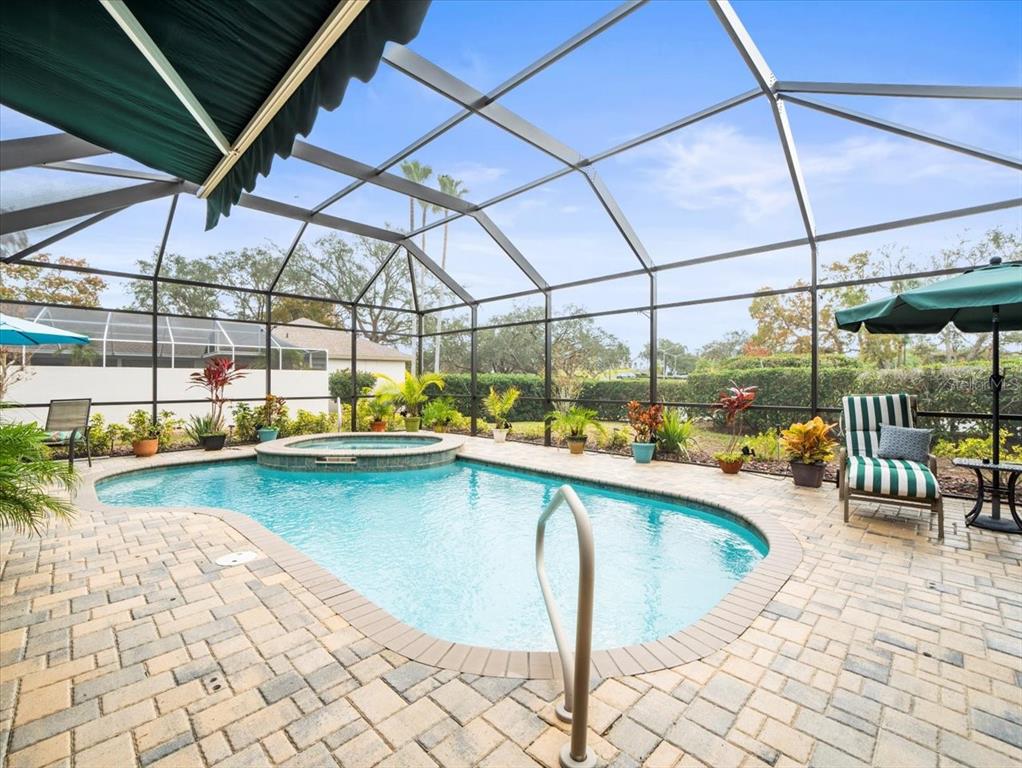 8480 Athens Court Weeki Wachee, FL 34613 - Photo 46 of 60 a view of swimming pool with outdoor seating