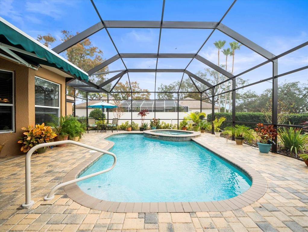 8480 Athens Court Weeki Wachee, FL 34613 - Photo 47 of 60 a view of a swimming pool with a patio