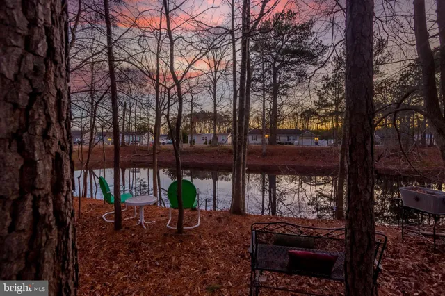 a view of a street with houses on both side
