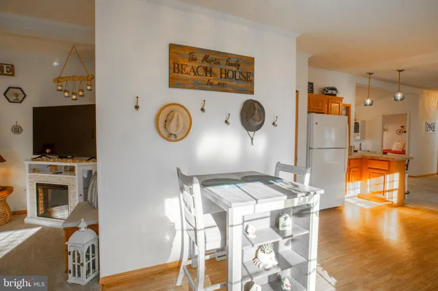 a kitchen with stainless steel appliances granite countertop a stove and a refrigerator