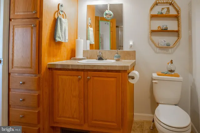 a backyard of a house with outdoor seating