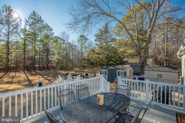 a outdoor space with lots of white furniture