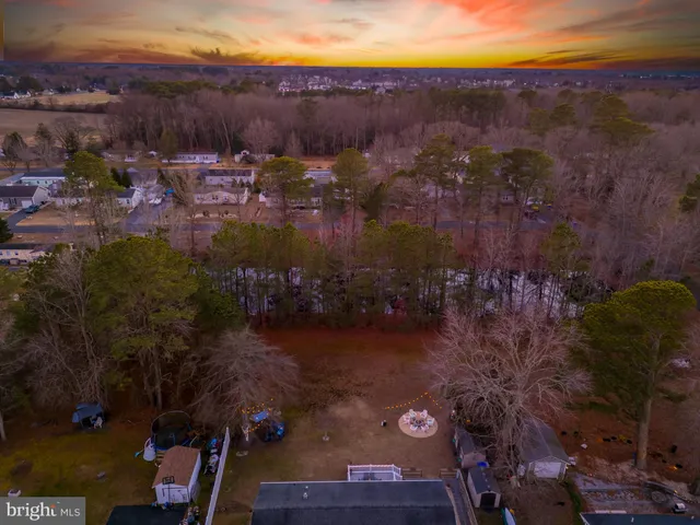 a view of multiple houses with outdoor space