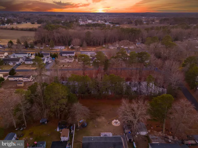 a view of a backyard of the house