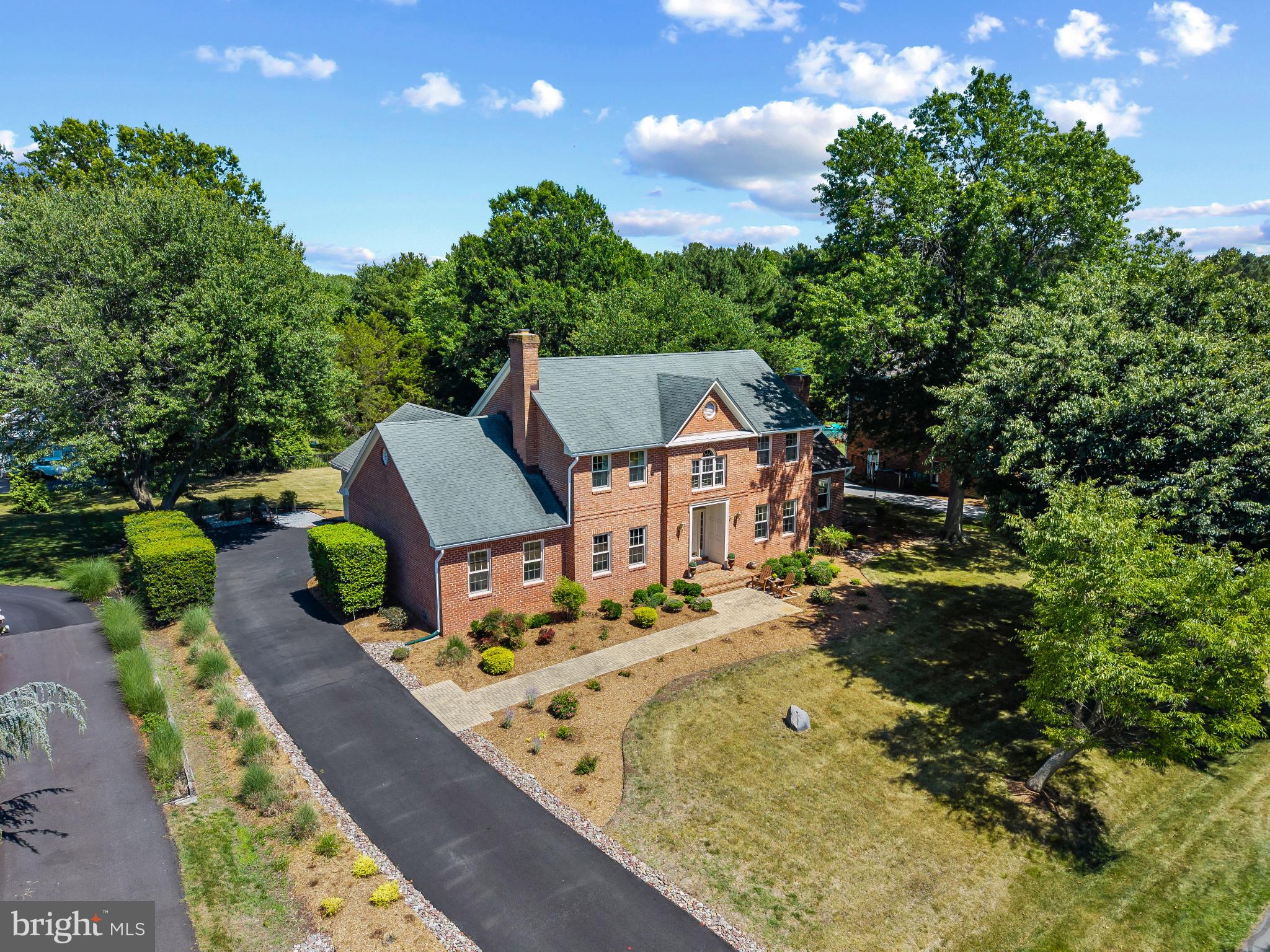 3403 Hidden River View Road Annapolis, MD 21403 - Photo 50 of 50 an aerial view of a house with swimming pool garden and patio