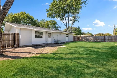 a view of a backyard with a garden